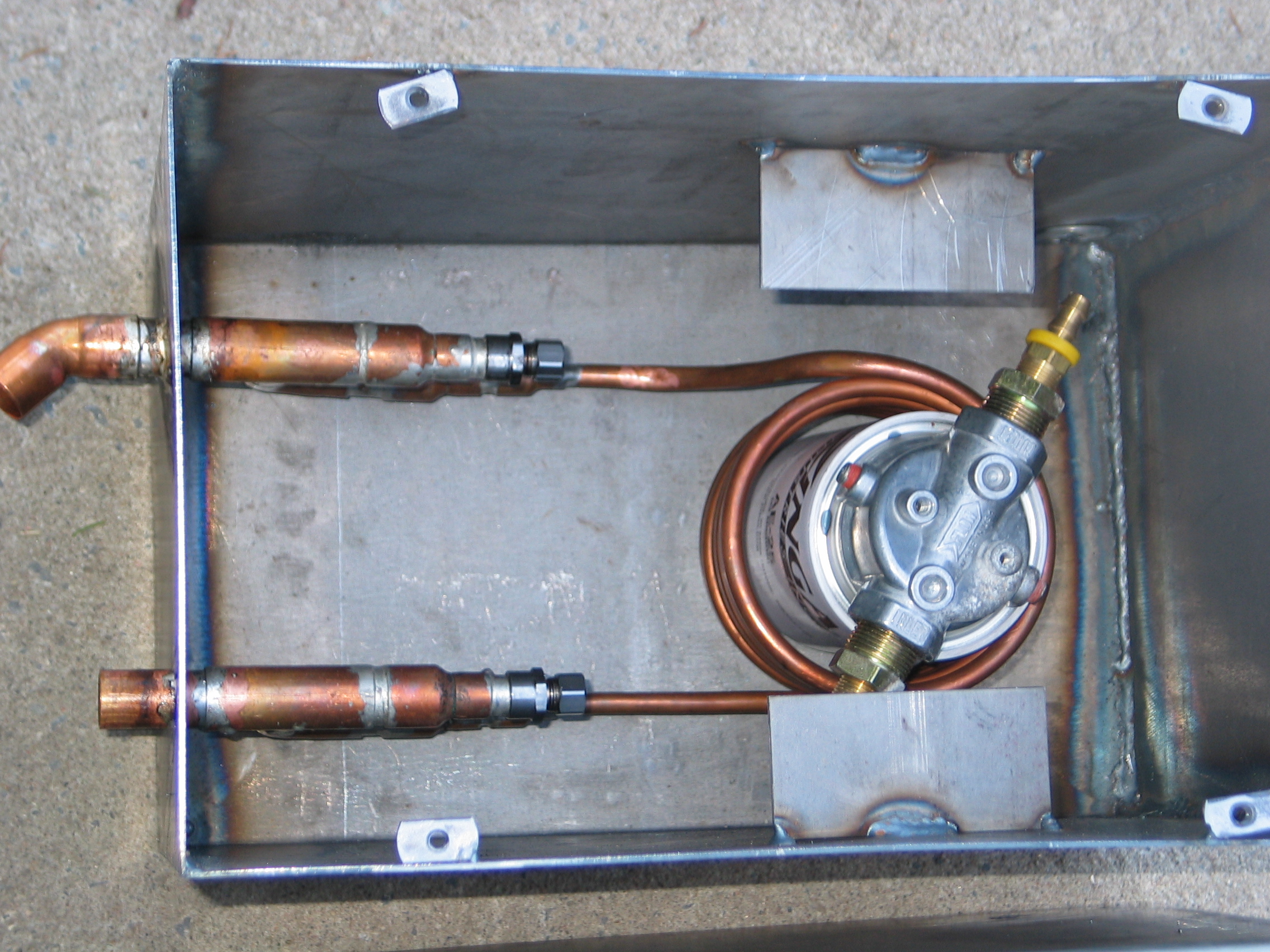 Réservoir à l'huile chauffant